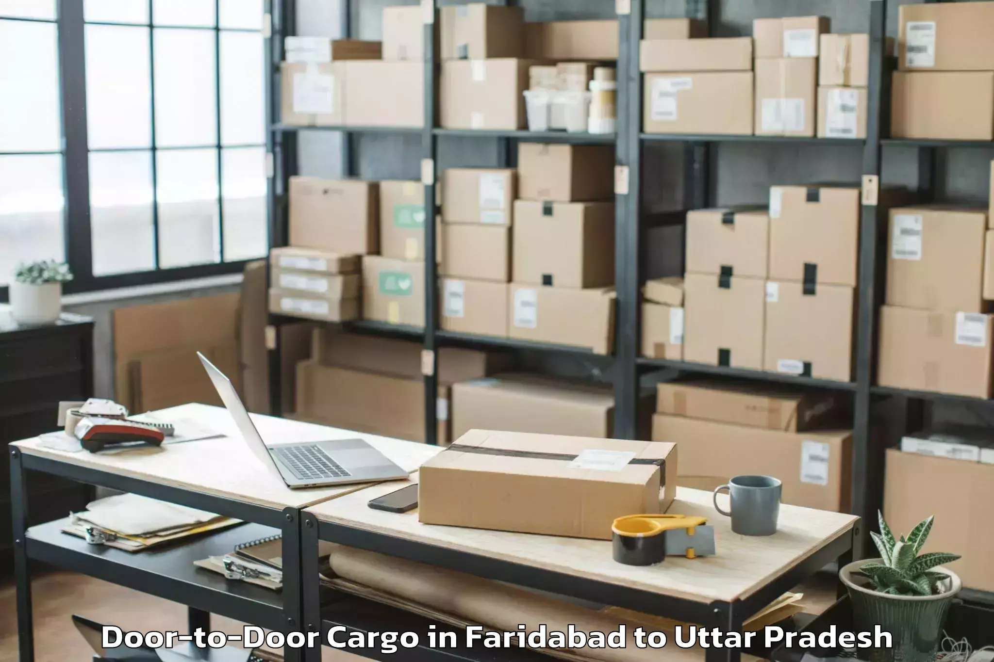 Easy Faridabad to Colonelganj Door To Door Cargo Booking